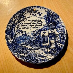 Blue and White Decorative Plate cottage of content